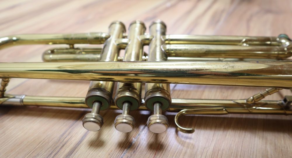 A Boosey & Hawkes Regent brass trumpet, cased